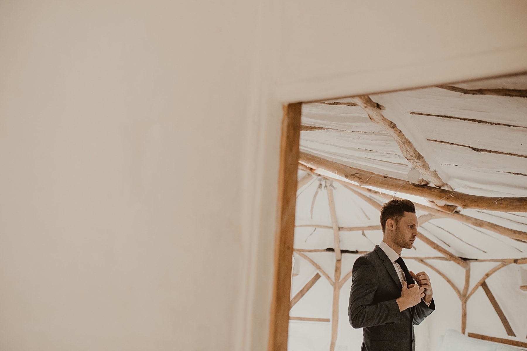 Best man getting ready in yurt